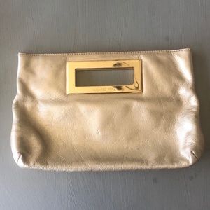 Michael Kors gold leather clutch